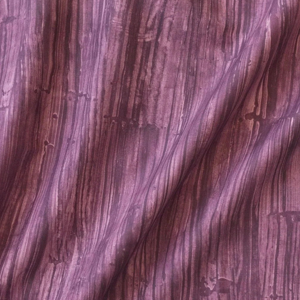 Close-up of purple fabric with a textured pattern