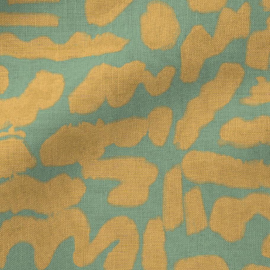 Textile with abstract yellow pattern on a teal background